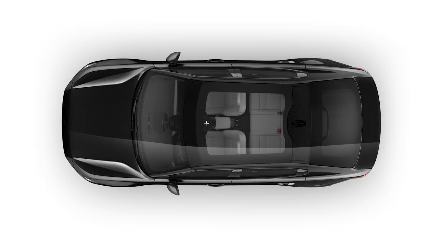 A bird’s eye view of Polestar 2 in Space colour with the panoramic roof.