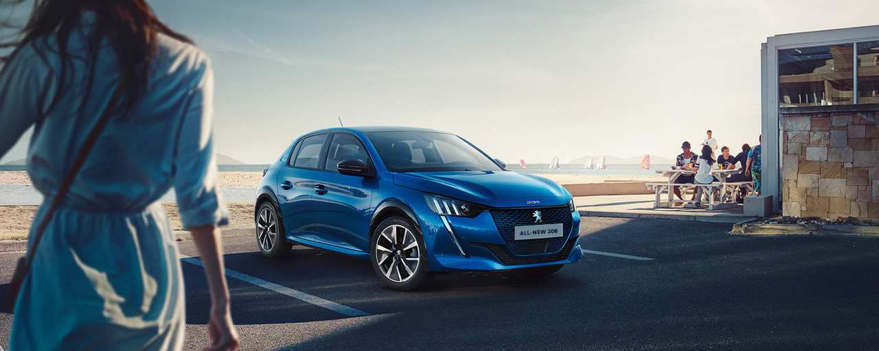 Truscott S Peugeot Barnstable Takes Uk S First Peugeot E 208 Ev