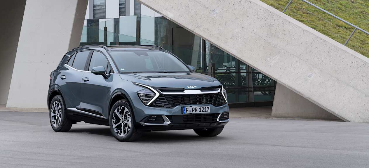 Kia Sportage 2022 gris trois quarts avant droit
