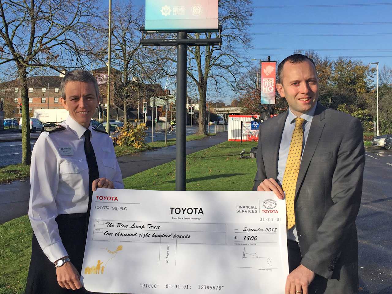 Snows Toyota help donate £1,800 towards local charity for their work in fighting household dangers