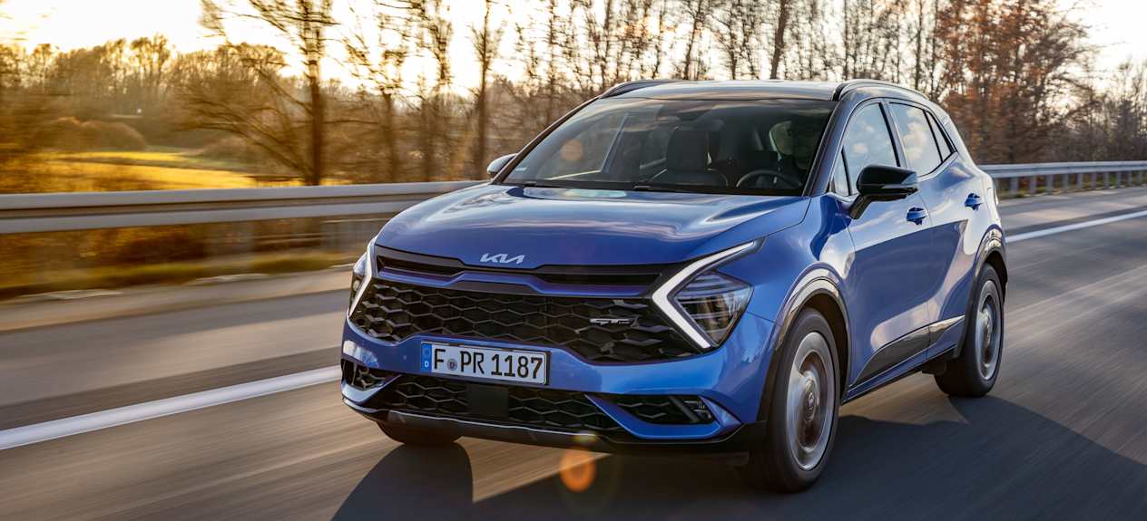 Kia Sportage 2022 bleu trois quarts avant gauche