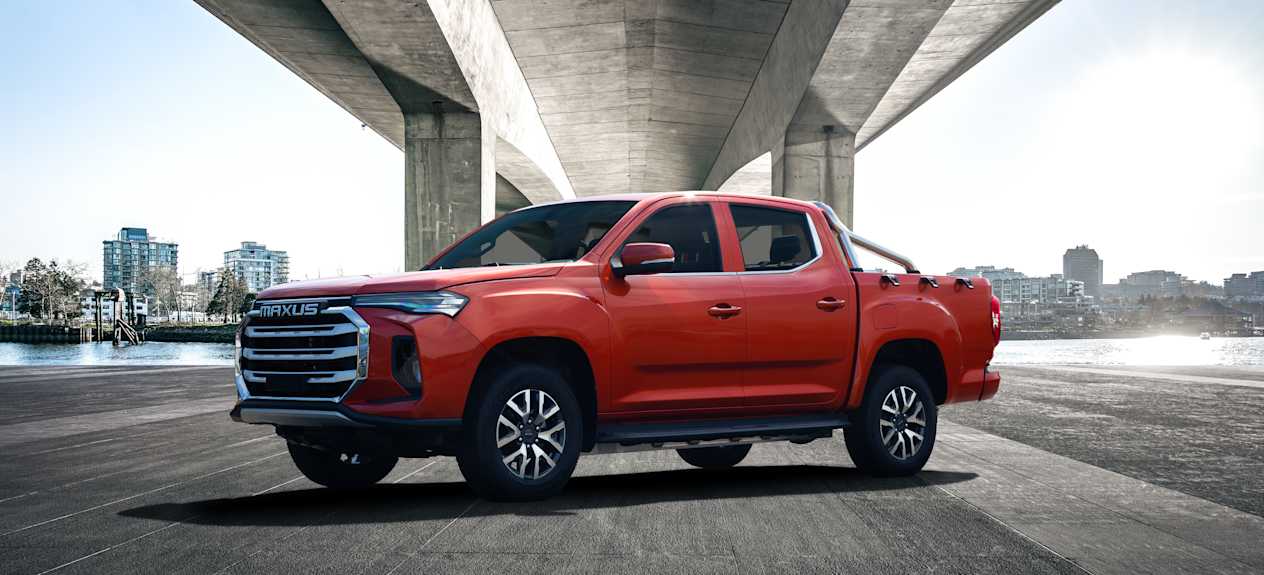 Red Maxus T90 EV Side Profile Under an Overpass