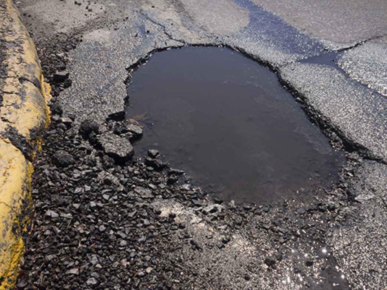 FREE POTHOLE SAFETY CHECK JOHN CLARK MOTOR GROUP