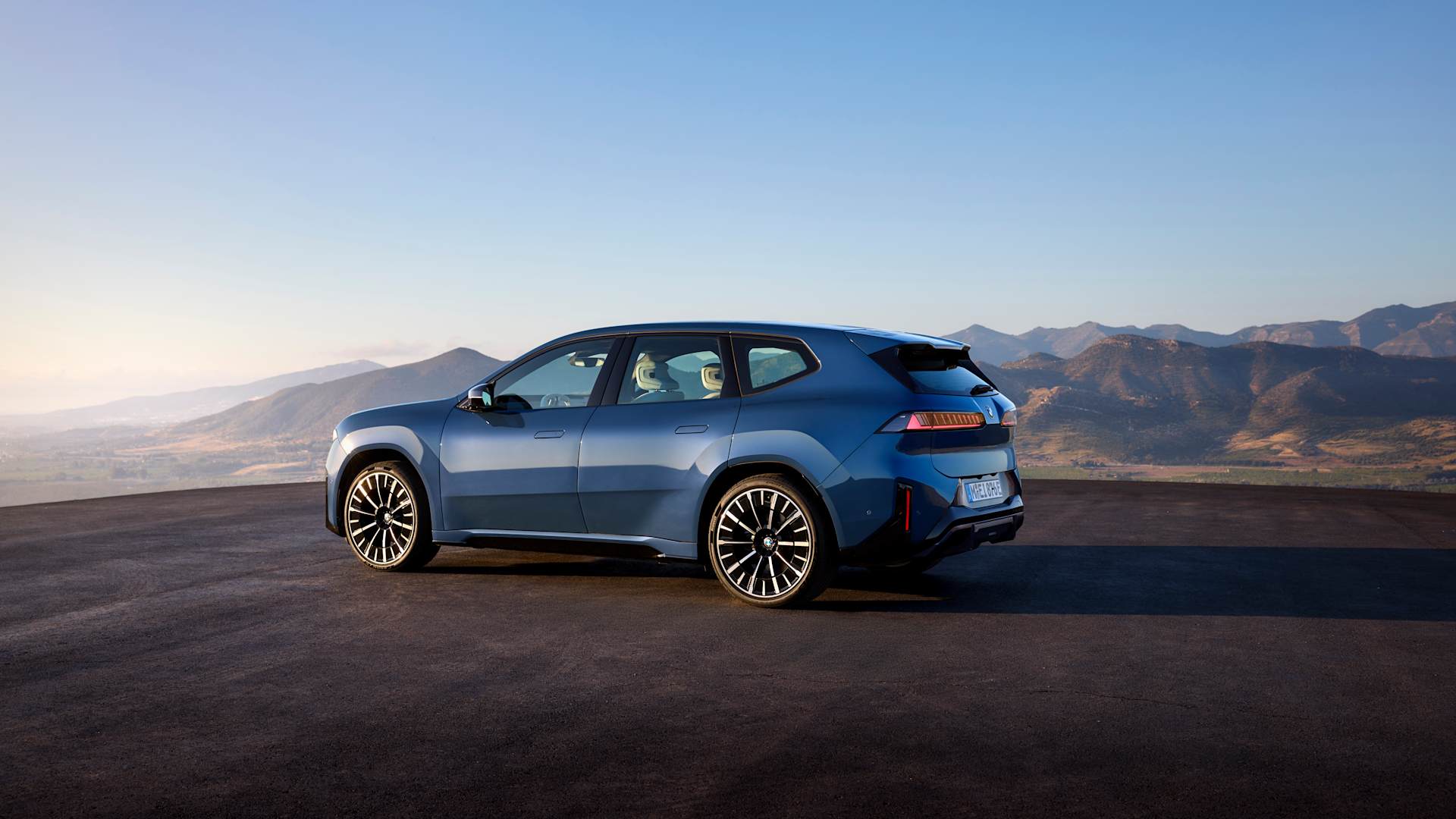 Front view of the new BMW iX3 - all-electric SAV with bold design and illuminated kidney grille.