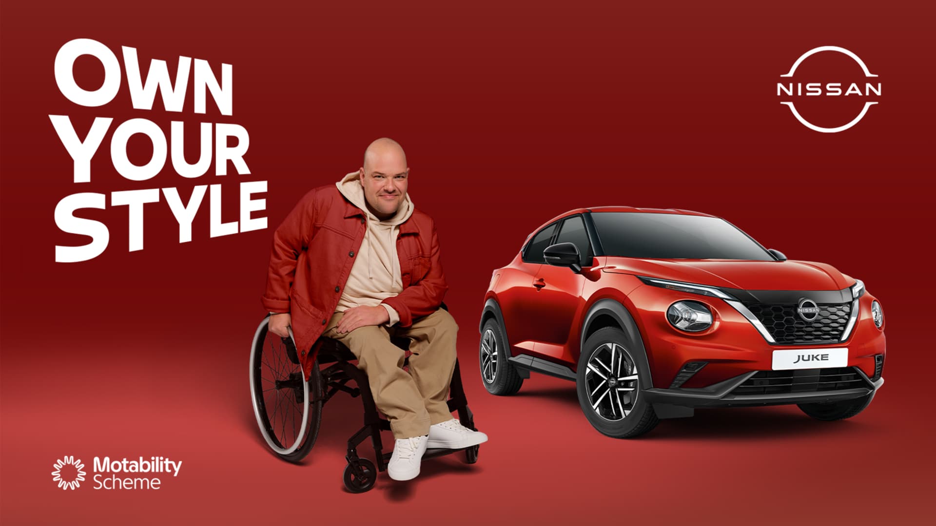 Man in wheelchair beside red Nissan Juke with “Own Your Style” text and Nissan/Motability logos