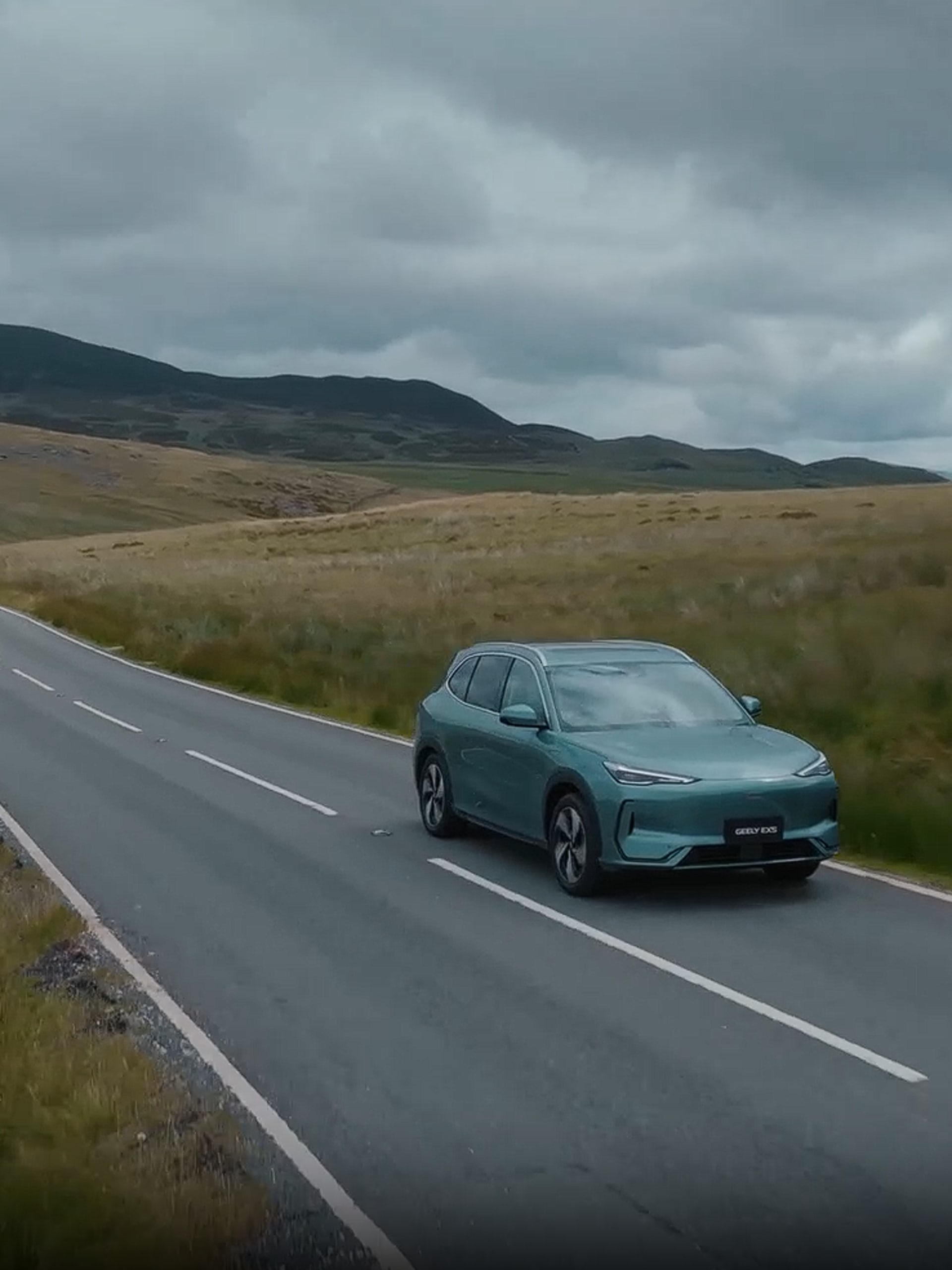 Geely EX5 driving on country road