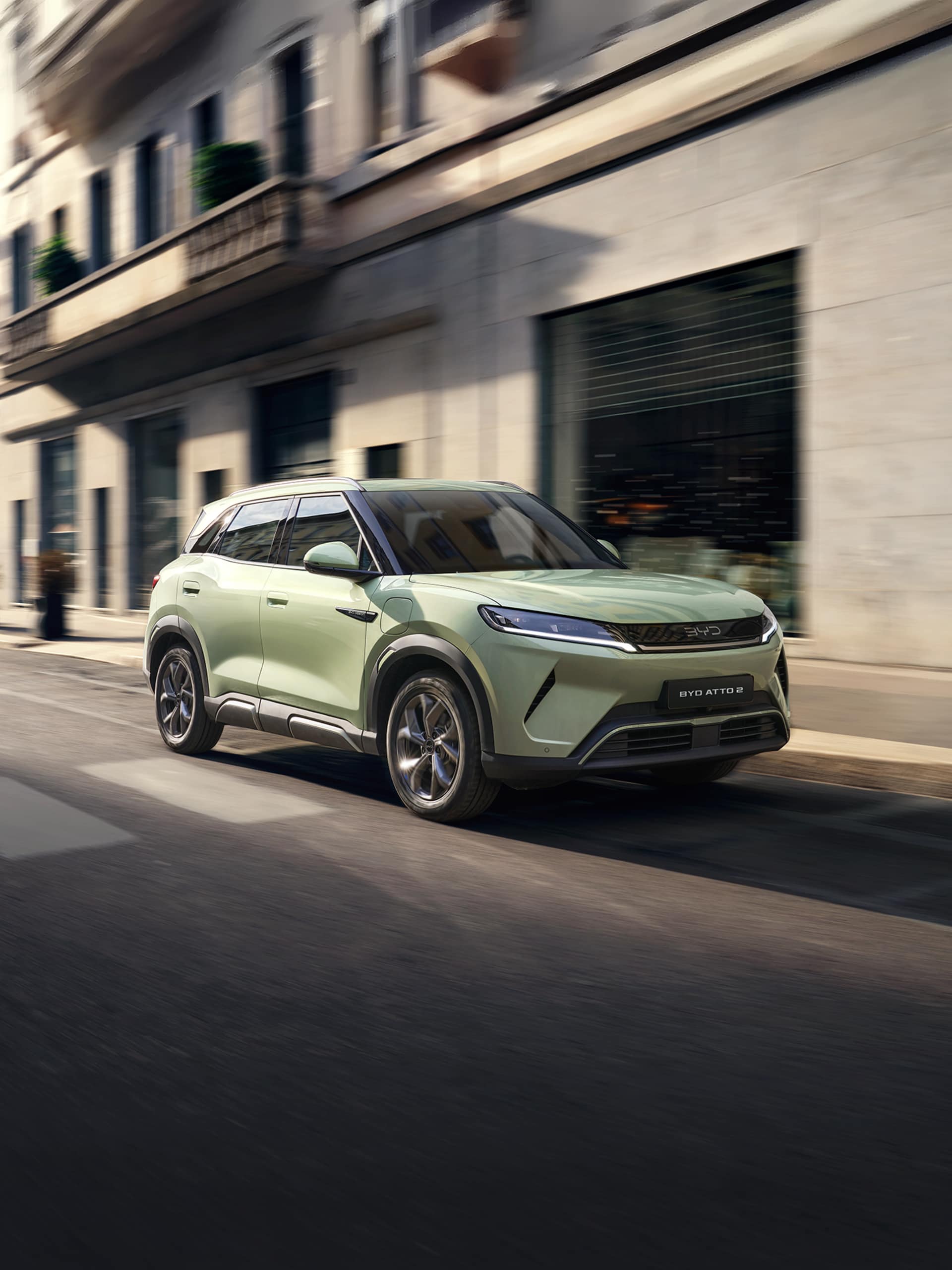 BYD Atto 2 Green Exterior Driving on City Road