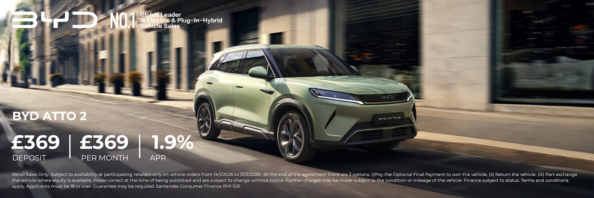 BYD Atto 2 Green Exterior Driving on City Road