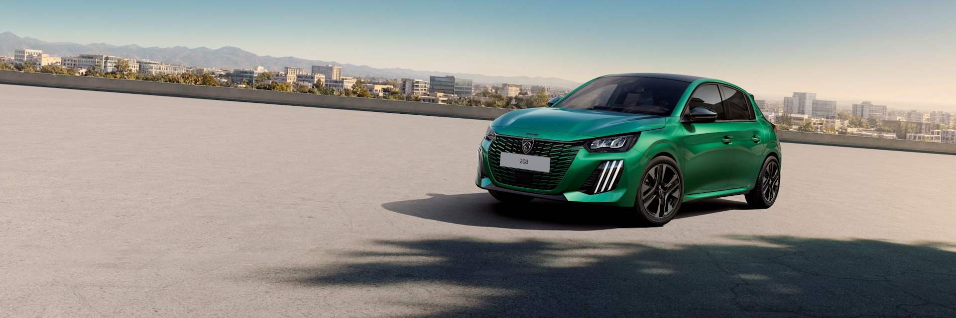 Peugeot 208 Envy pictured on a car park roof
