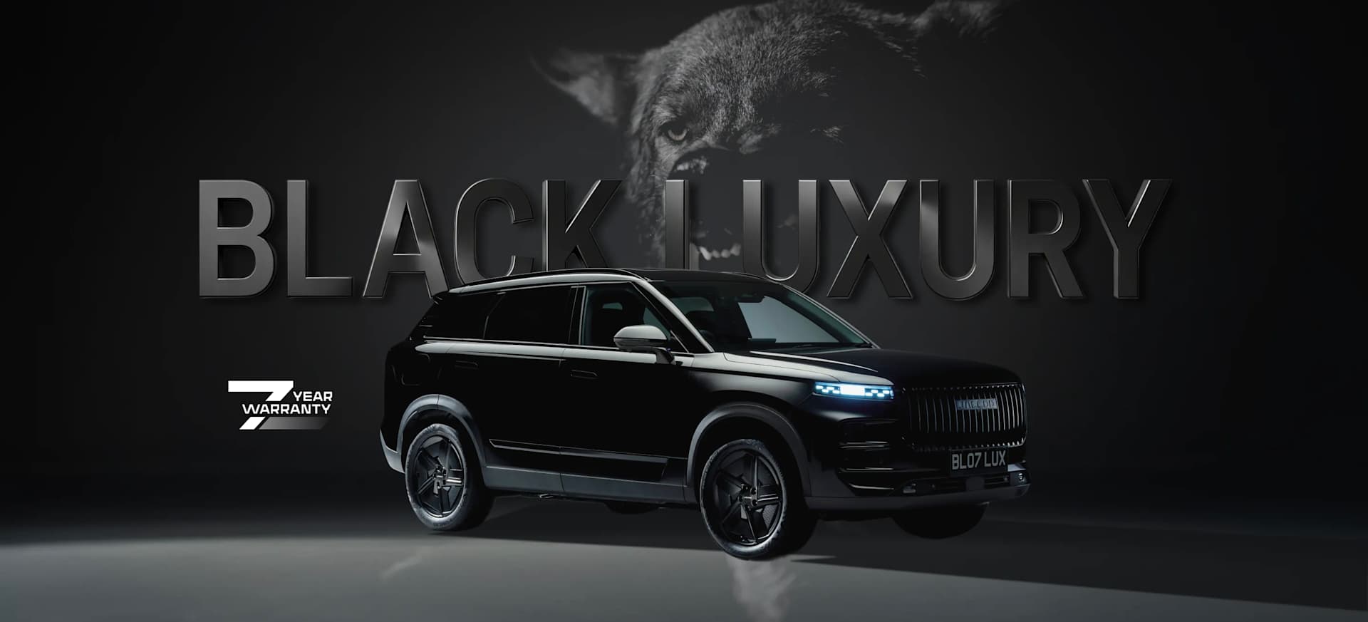 A sleek modern JAECOO 7 Black Luxury SUV on a dark background with a wolf in the background