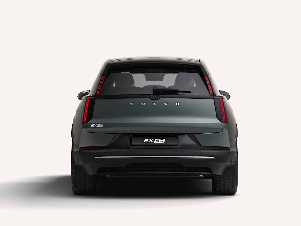 Rear view of a Volvo EX60, showcasing its sleek design and distinctive taillights.