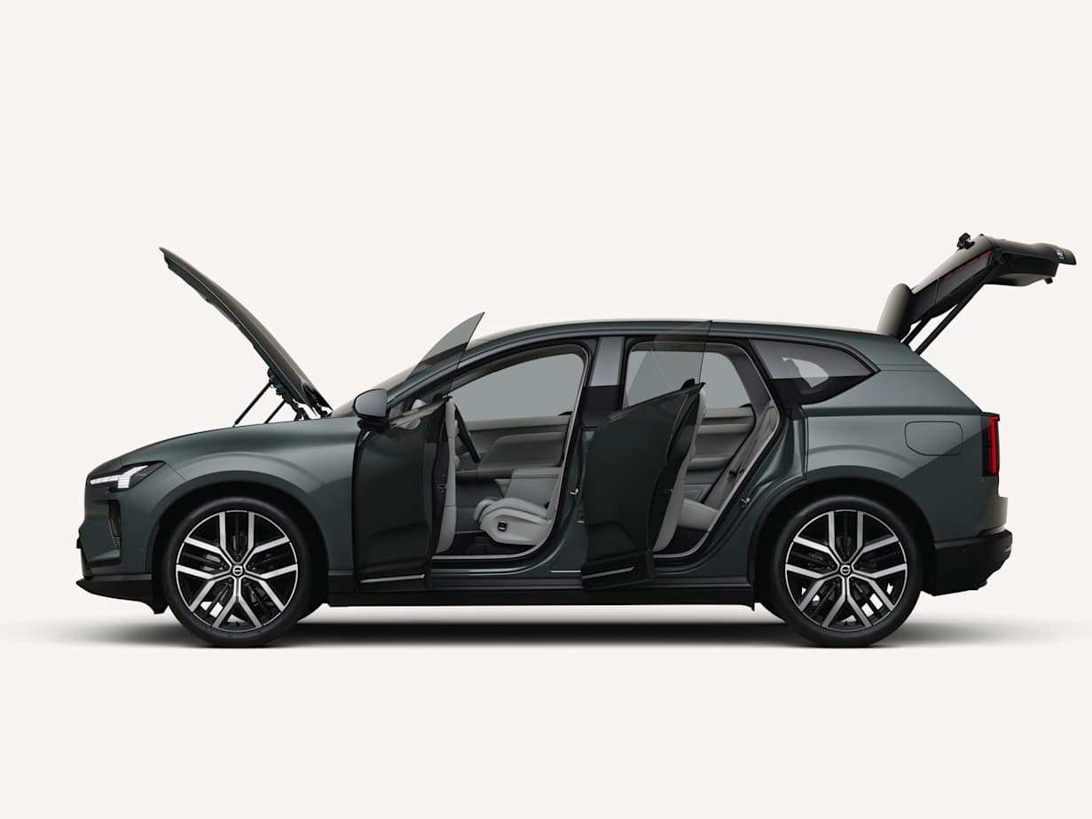 A sleek Volvo EX60 with open doors and a raised rear hatch, showcasing its spacious interior.
