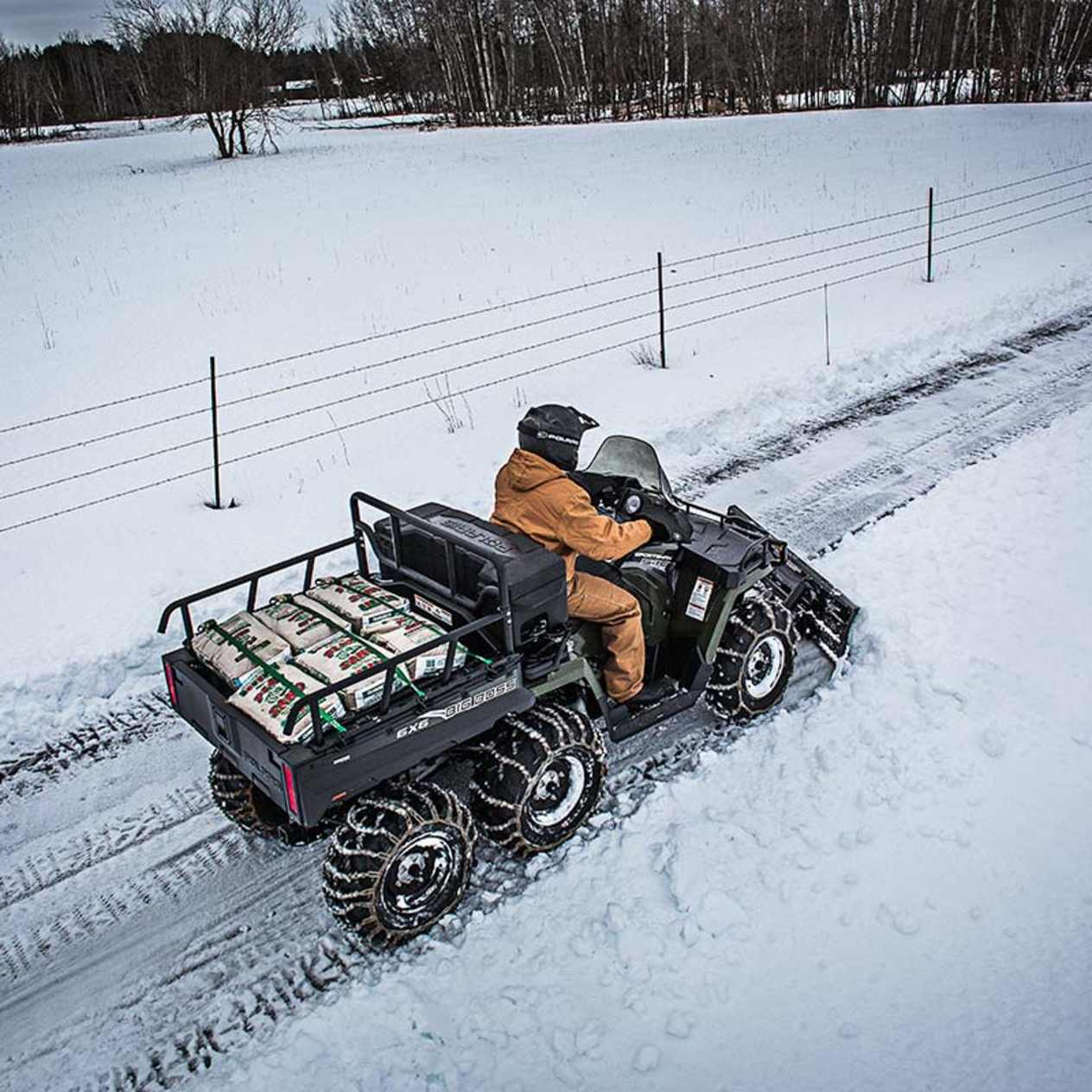 Polaris Sportsman 6x6 570 2023 : chasse neige vue aérienne