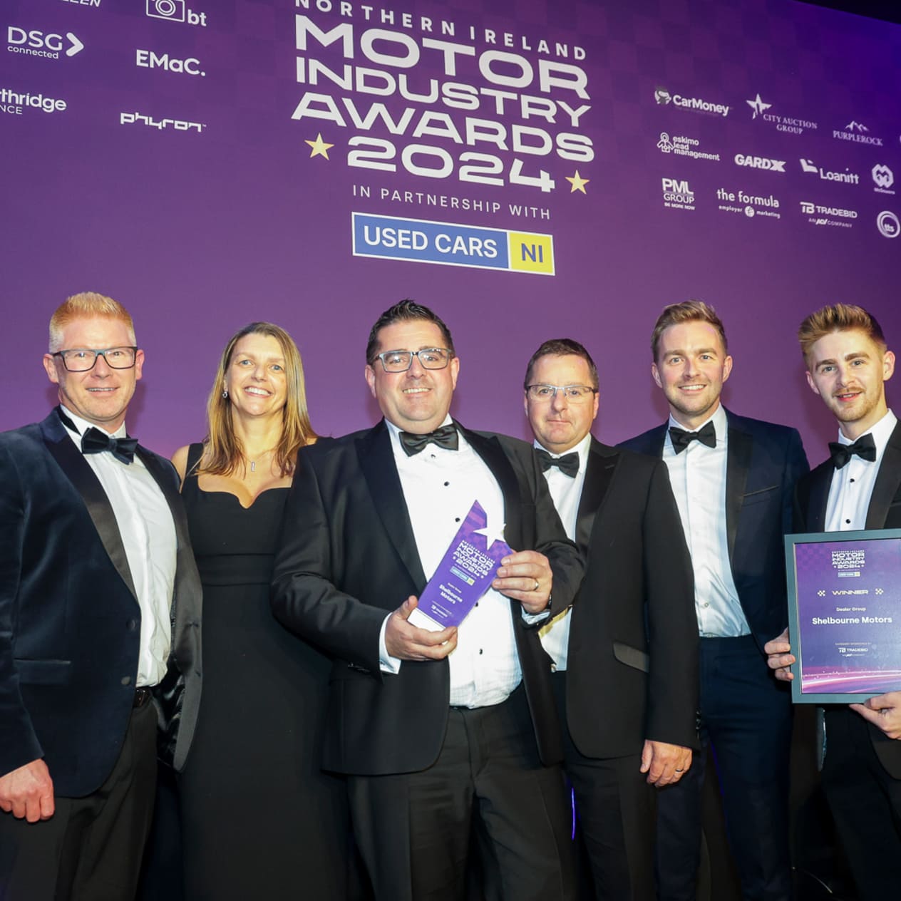 Alan Thompson, Caroline Willis, Paul Ward, Richard Ward and Jack Ward from Shelbourne Motors, accepting the Dealer Group awar