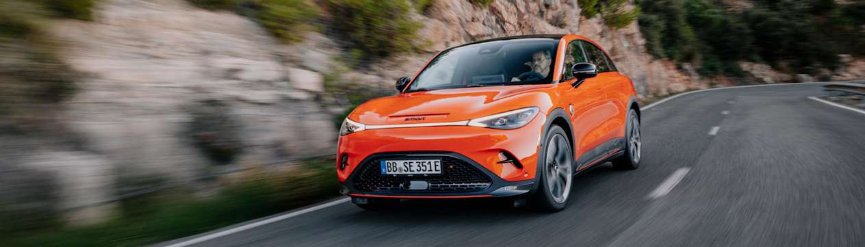 Smart #3 Brabus 2023 : trois quarts avant gauche sur route de montagne