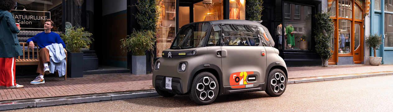 Citroën Ami Peps 2024 : trois quarts avant gauche statique dans la rue