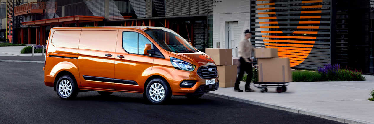 Orange Ford Transit Van
