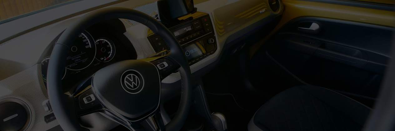 Close up of car interior around the front seats
