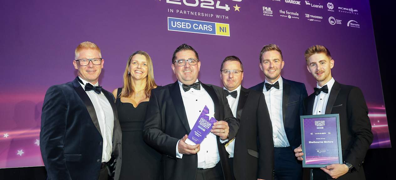 Alan Thompson, Caroline Willis, Paul Ward, Richard Ward and Jack Ward from Shelbourne Motors, accepting the Dealer Group awar