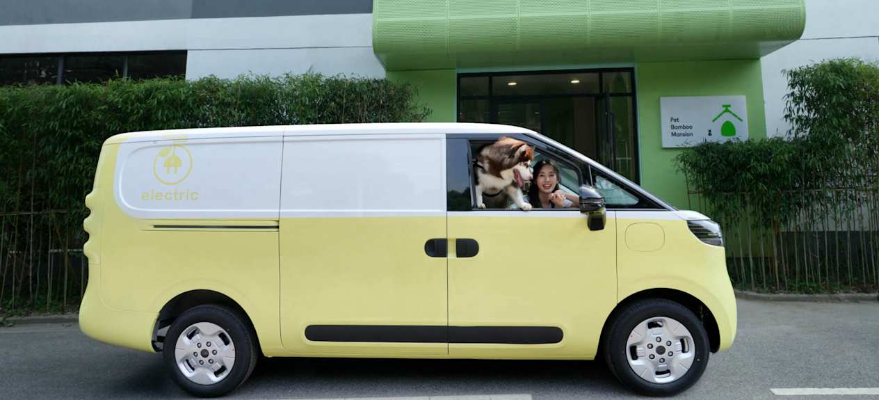 Two Tone Yellow Maxus eDELIVER 5 with furry friend