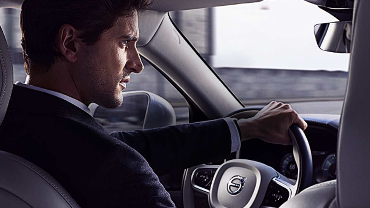 Man driving Volvo