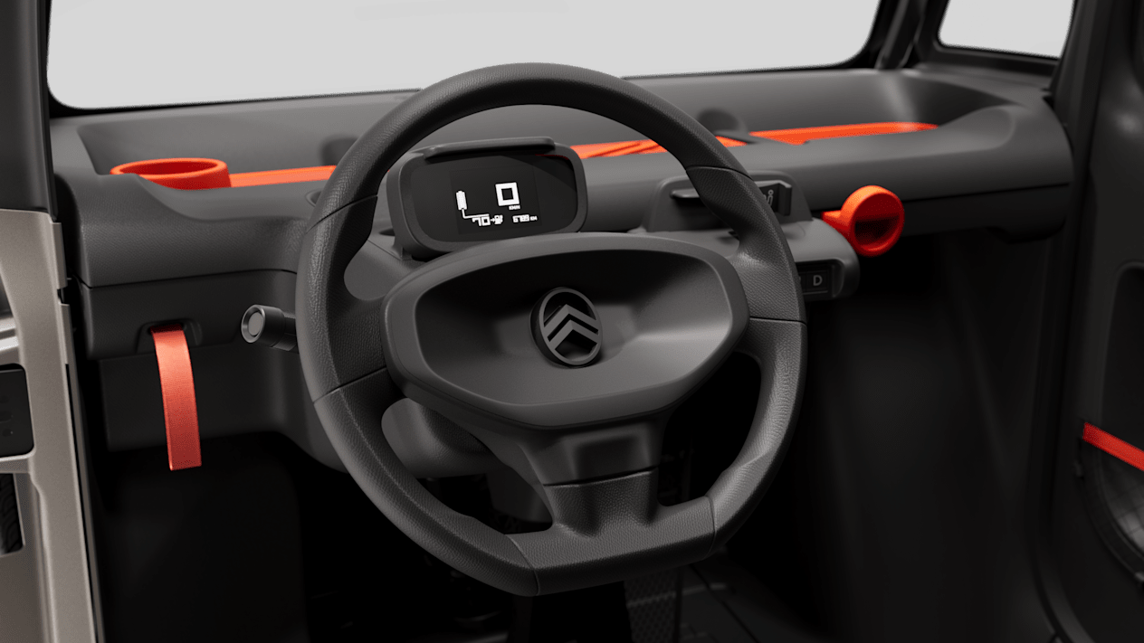 Citroën Ami Spicy 2025 : détail volant et écran compteurs