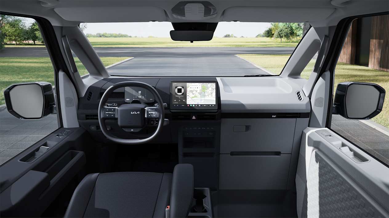 Kia PV5 Passenger 2025 : intérieur et planche de bord sans siège passager avant
