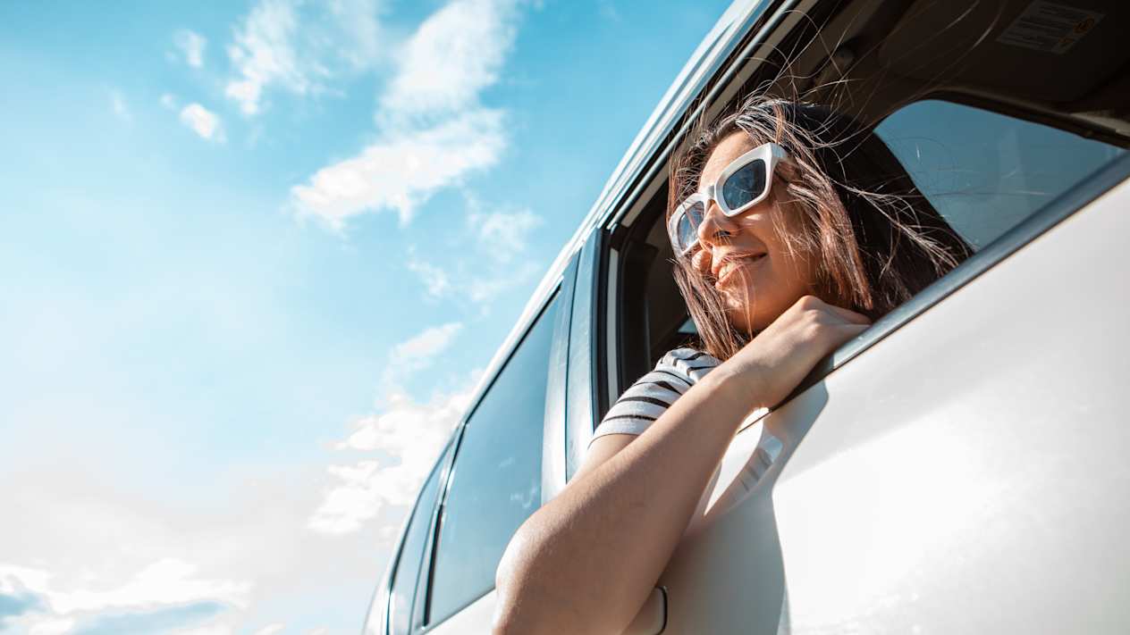 happy woman driving