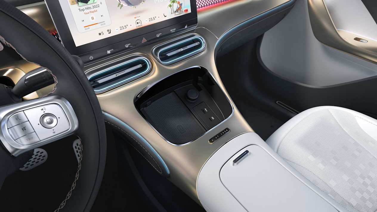 smart #1 : Habitacle avec gros plan console centrale et rangement ouvert avec chargeur à induction