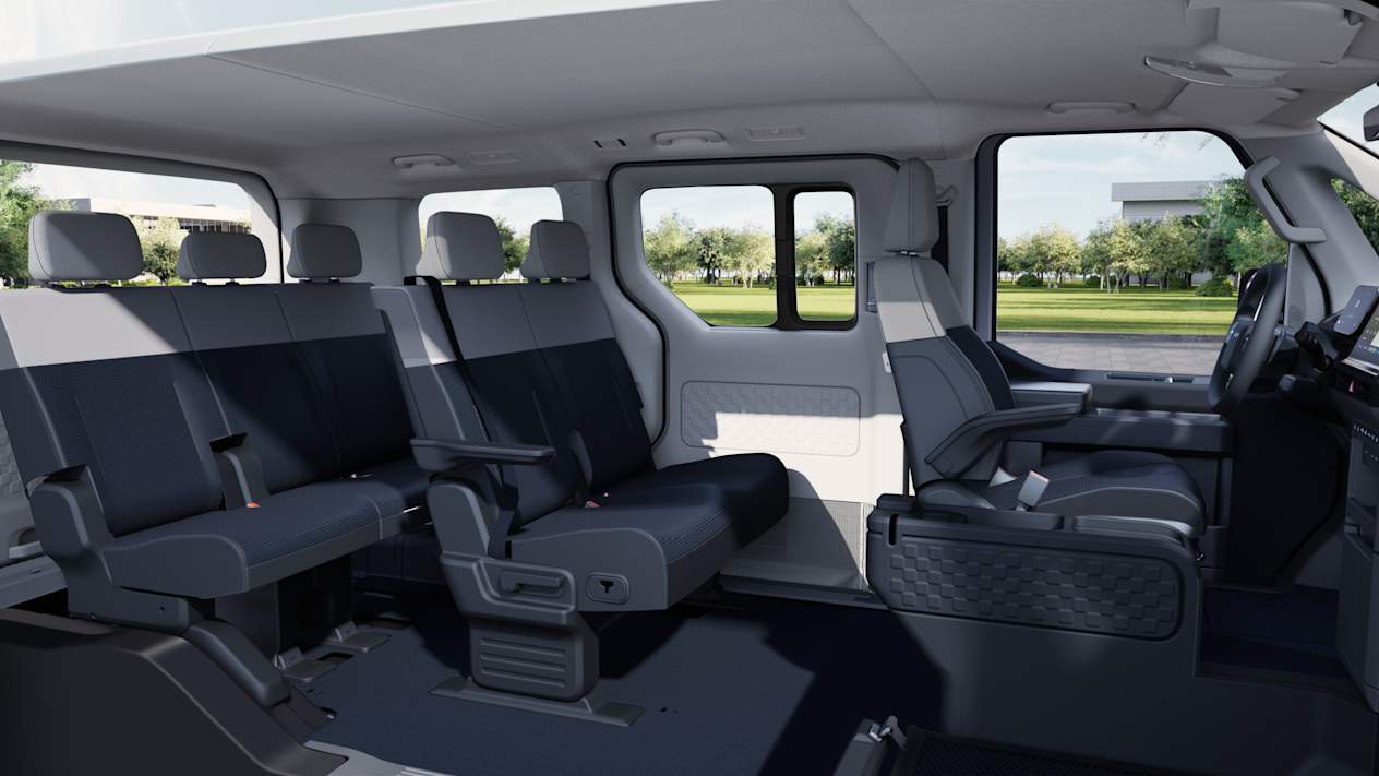 Kia PV5 Passenger 2025 : intérieur 6 places vu de profil