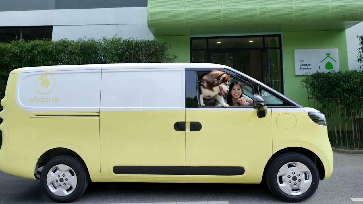 Two Tone Yellow Maxus eDELIVER 5 with furry friend