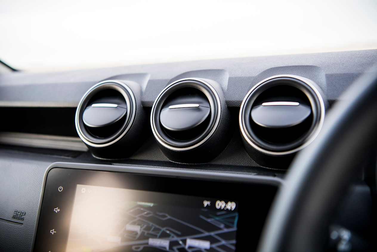 Close up of three air conditioning vents in the Dacia Duster