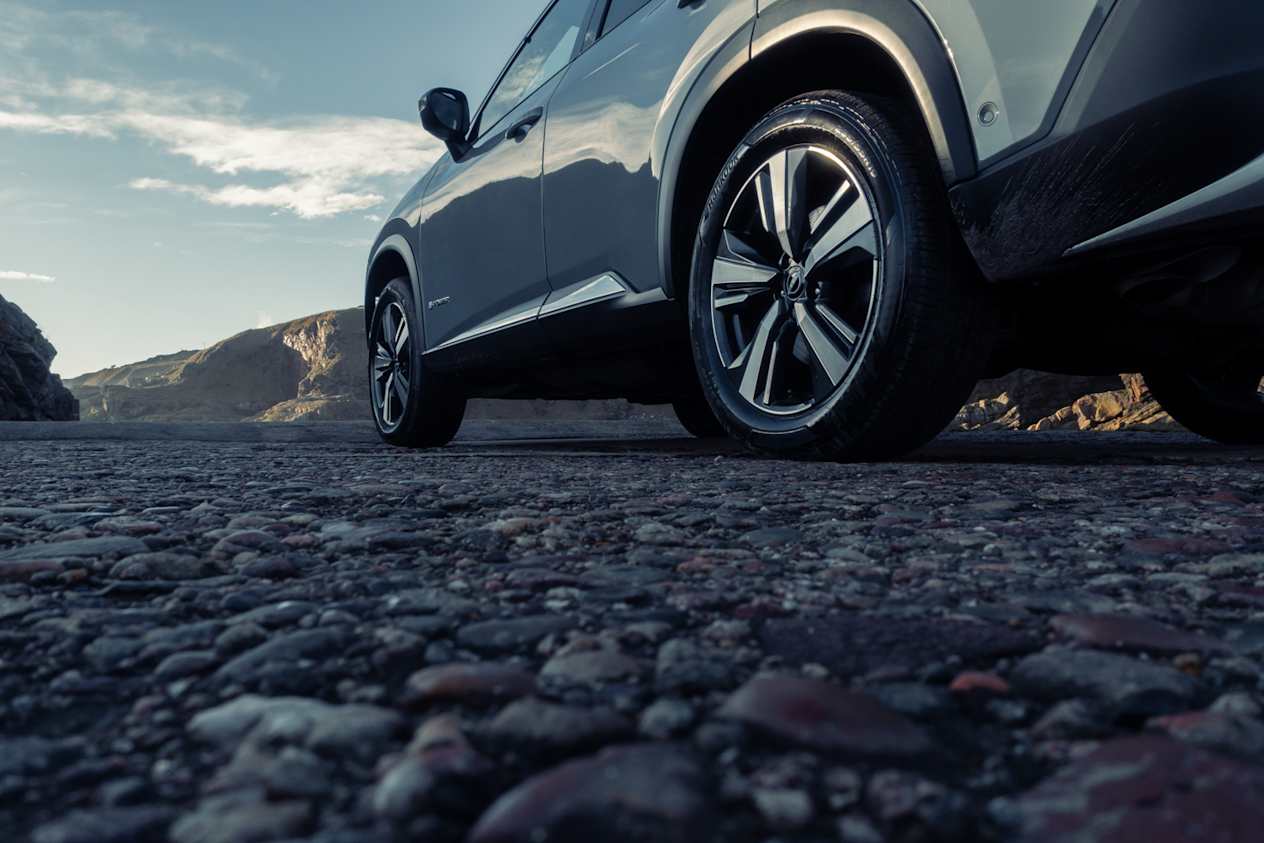 Close up of the lower half of a grey Nissan X-Trail