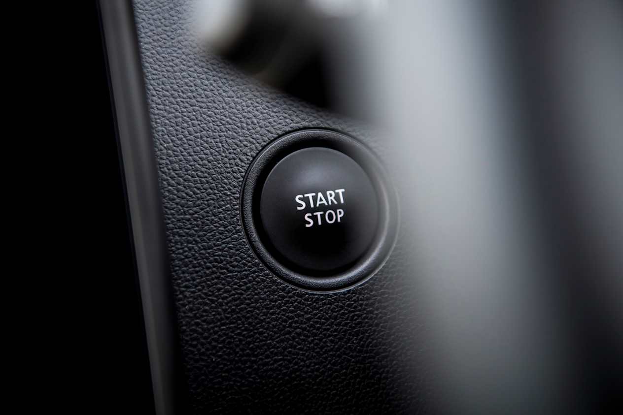 Close up of the start stop button in the Dacia Duster
