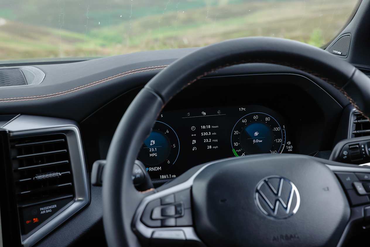 Close up of the steering wheel and digital driver's display in the Volkswagen Amarok