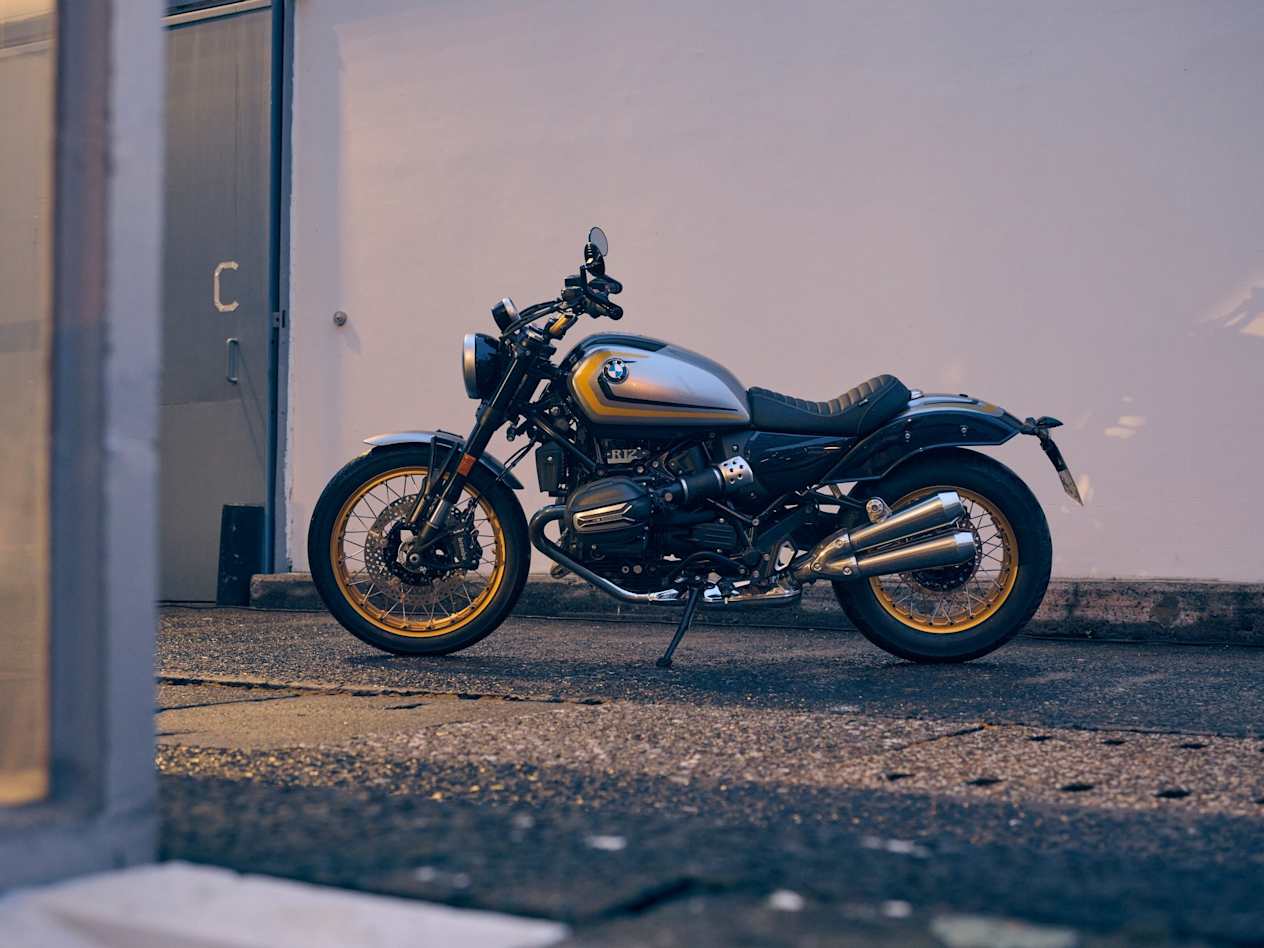 A parked silver, yellow, and  black BMW Motorrad R 12 bike