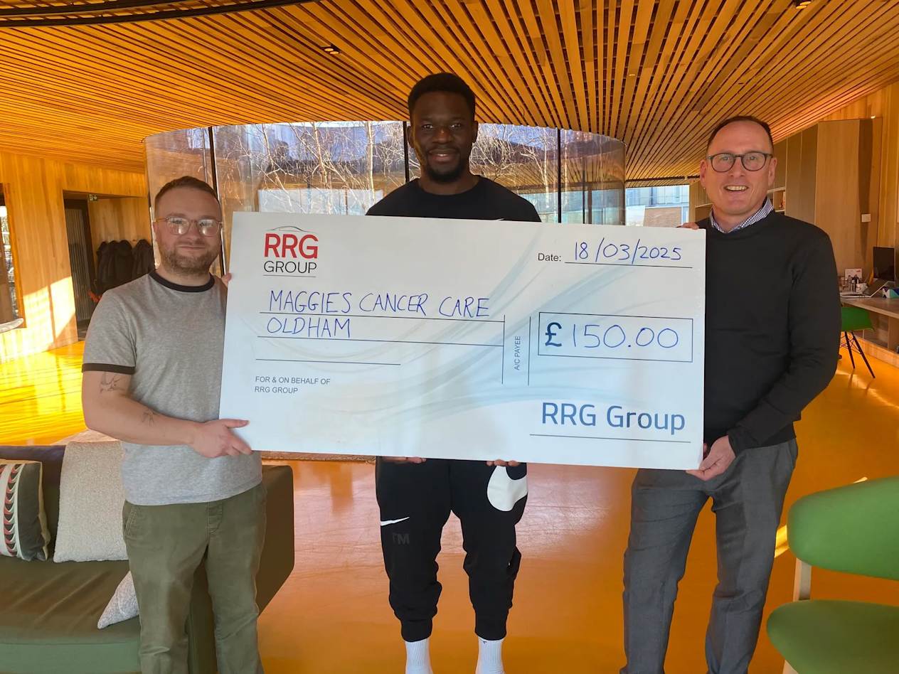 Latics striker Mike Fondop donates Player of the Month Award to Maggie's Oldham.