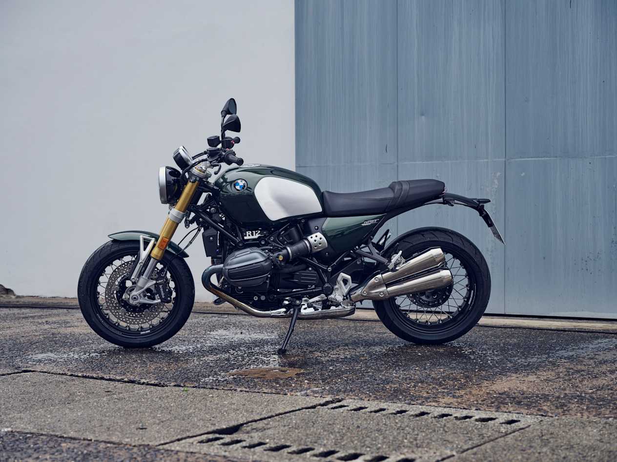 A parked green and black BMW Motorrad R 12 nineT bike