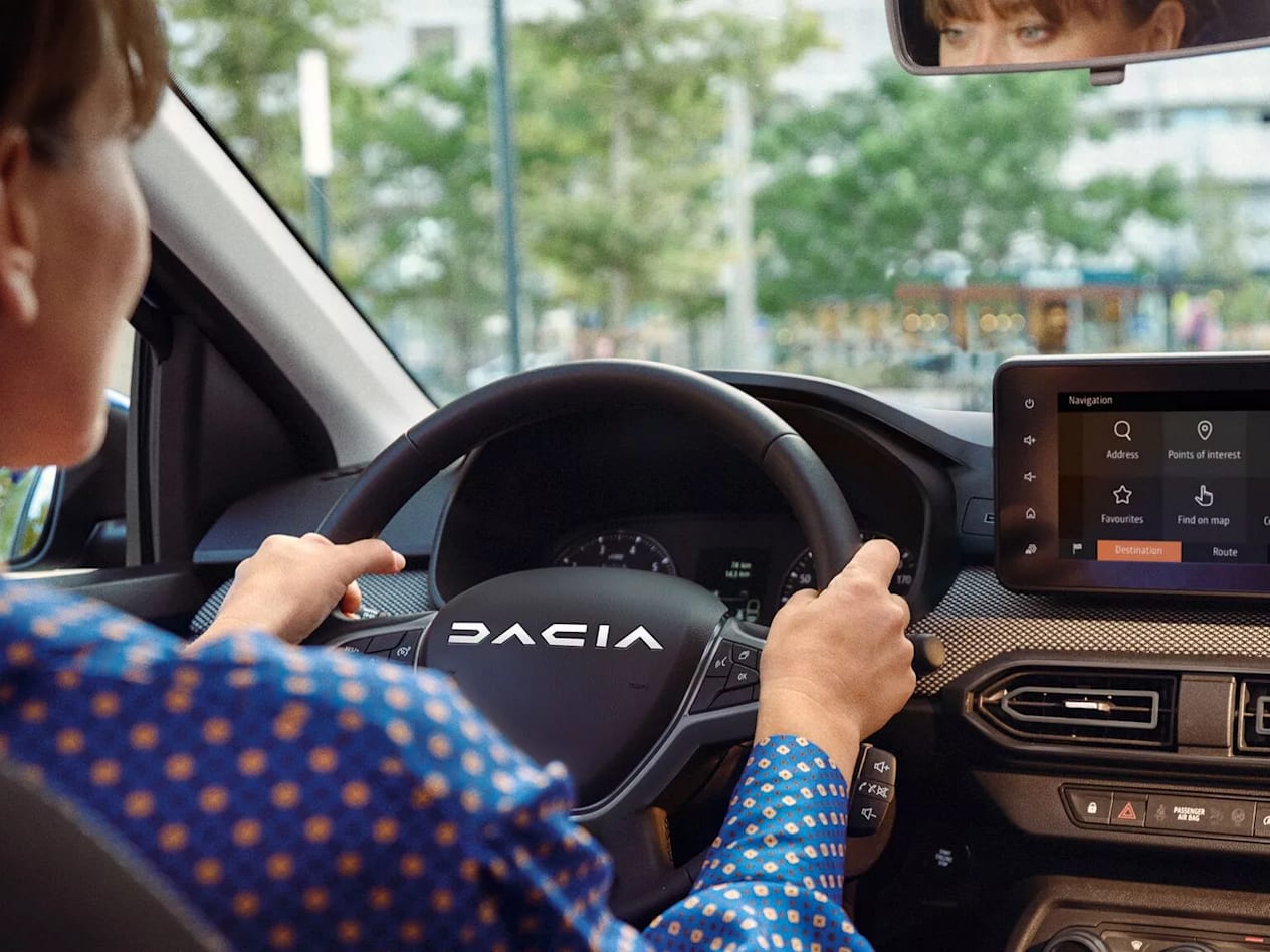 Woman Driving Sandero