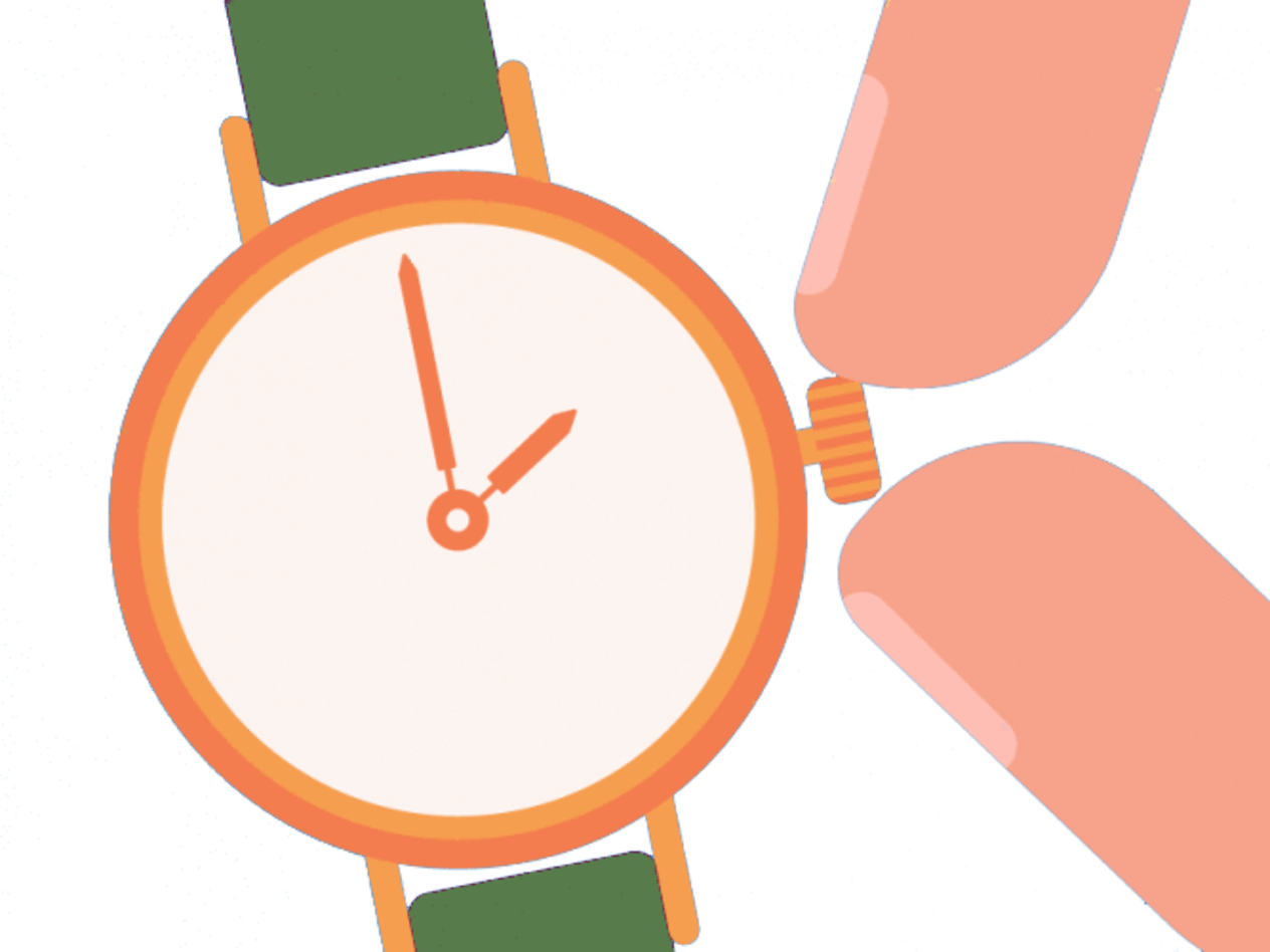 Doigt changeant l'heure sur une montre
