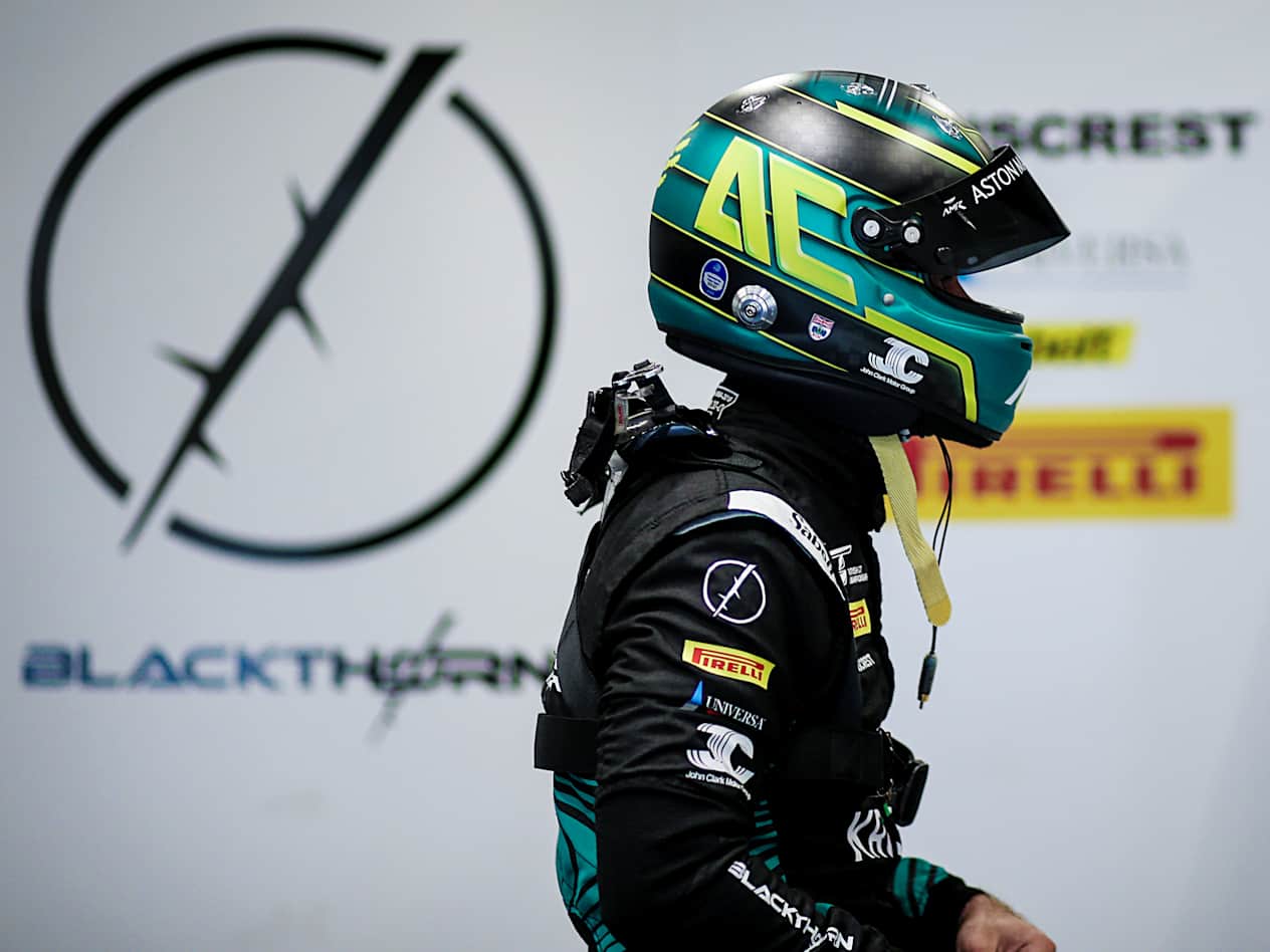 Jonny Adam in his full race sui and helmet