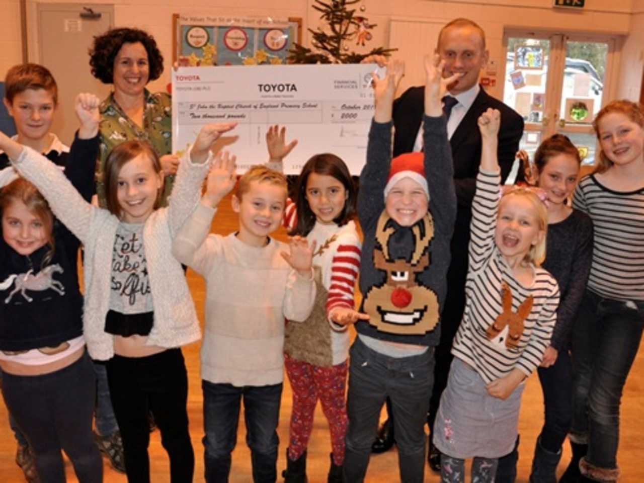 Snows Toyota donate towards smartboard for local school