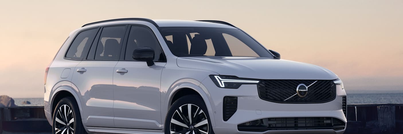 White Volvo XC90 beside the coast