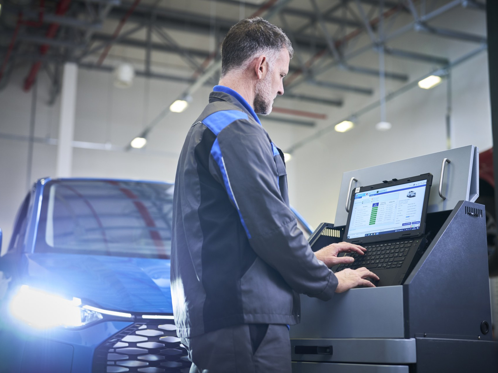 Ford technician monitoring connected vehicle health