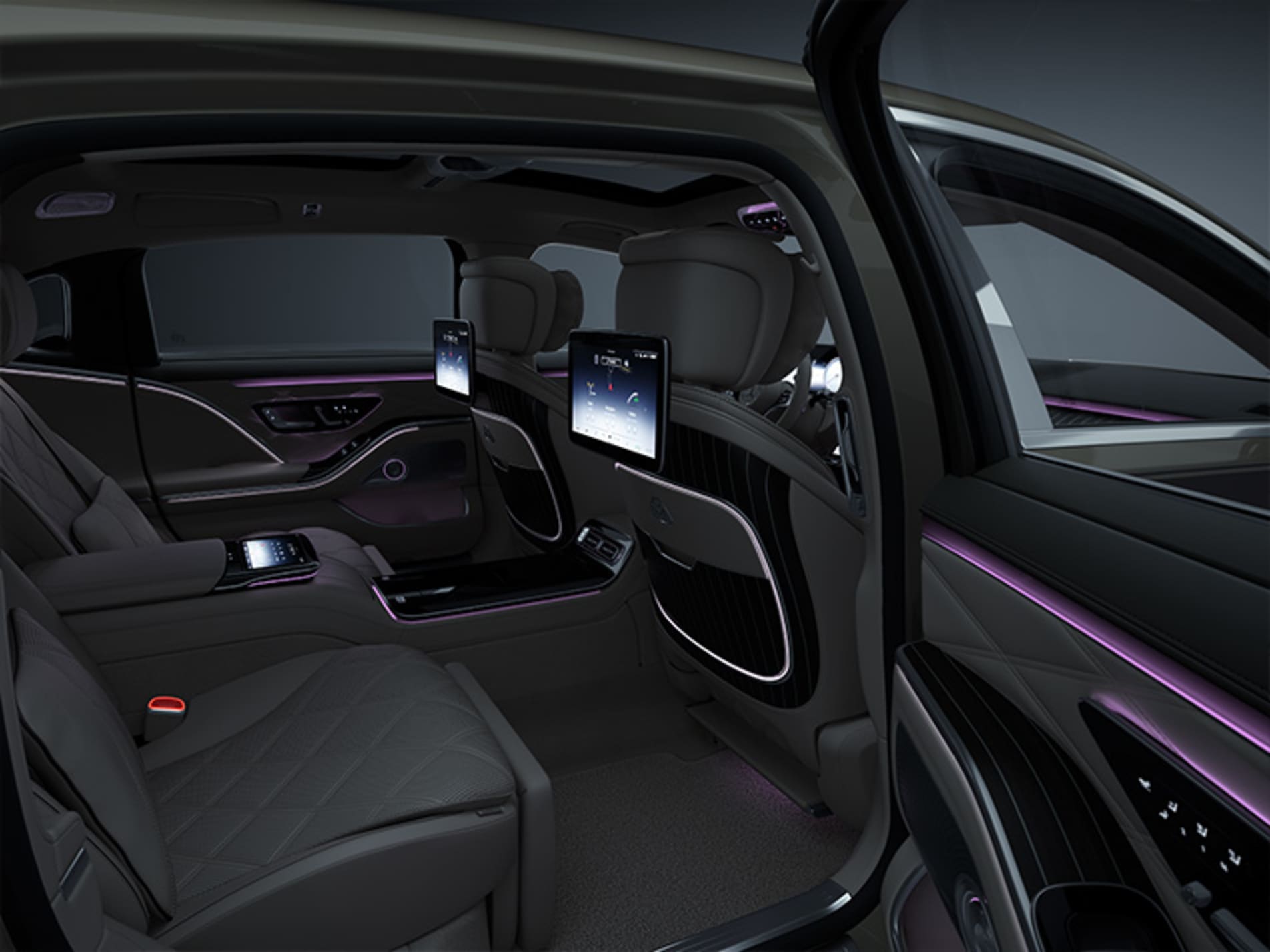 Mercedes-Maybach rear cabin with black leather seats and entertainment screens