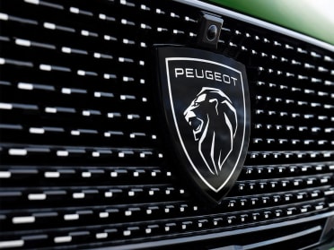 Company logo of the automobile manufacturer Peugeot with seat in