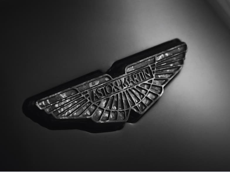 Machined Carbon Fibre Wings Badges Cambridge Sevenoaks Jardine Motors Nowadays, the badge of a car often flies under the radar as not incredibly significant, but things used to be after skipping paint, the raw copper badge is polished to produce a set of aston martin wings. machined carbon fibre wings badges