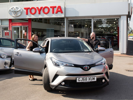RRG Toyota Sales Exec with customer