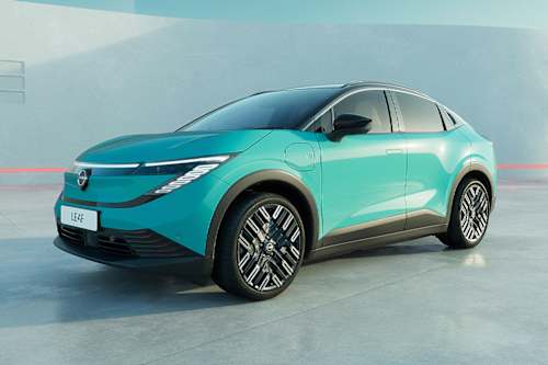 A modern electric Nissan LEAF in a vibrant turquoise colour, showcased in a minimalist setting.