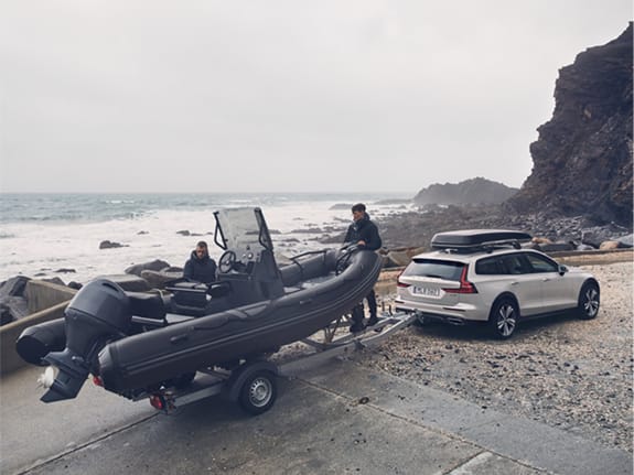 Volvo V90 Cross Country shown towing a large inflatable rib boat